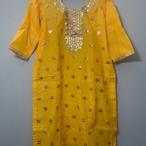 Yellow beautiful kurti with gottapati work